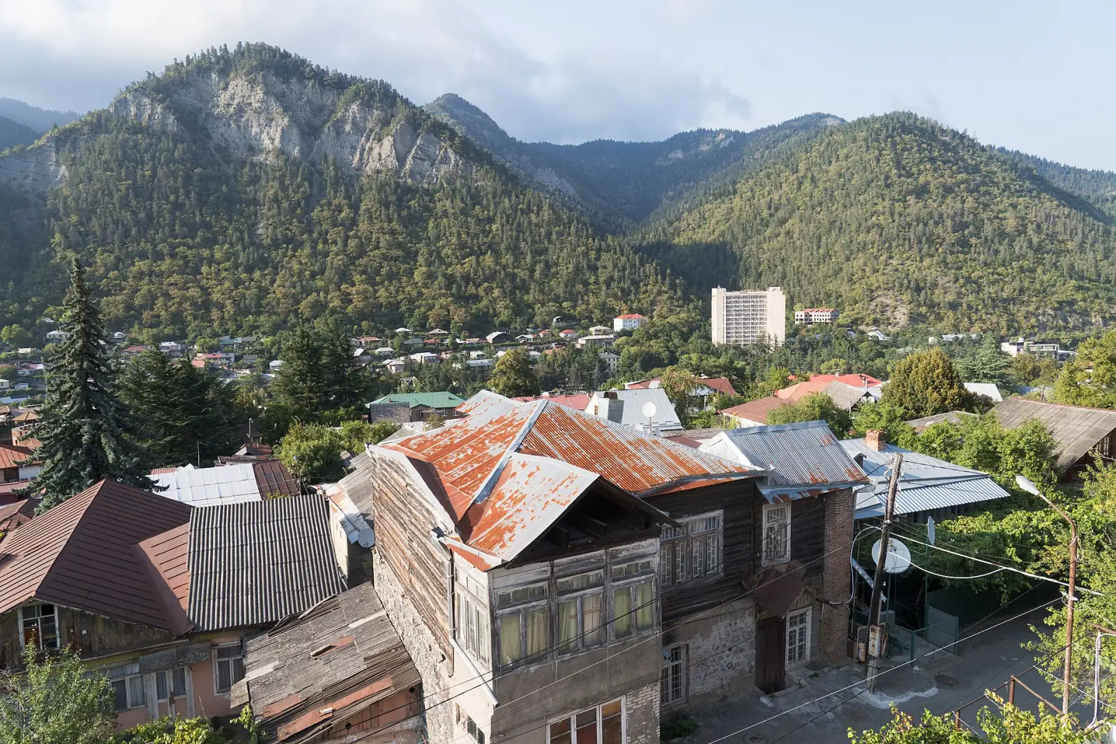 Borjomi rooftops beneath wooded hills in the valley