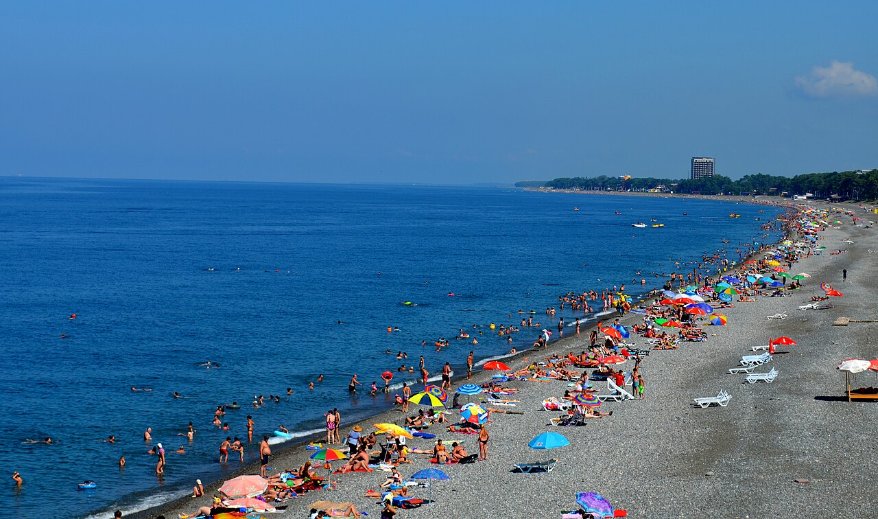 Visitors spread along Kobuleti's broad Black Sea beach