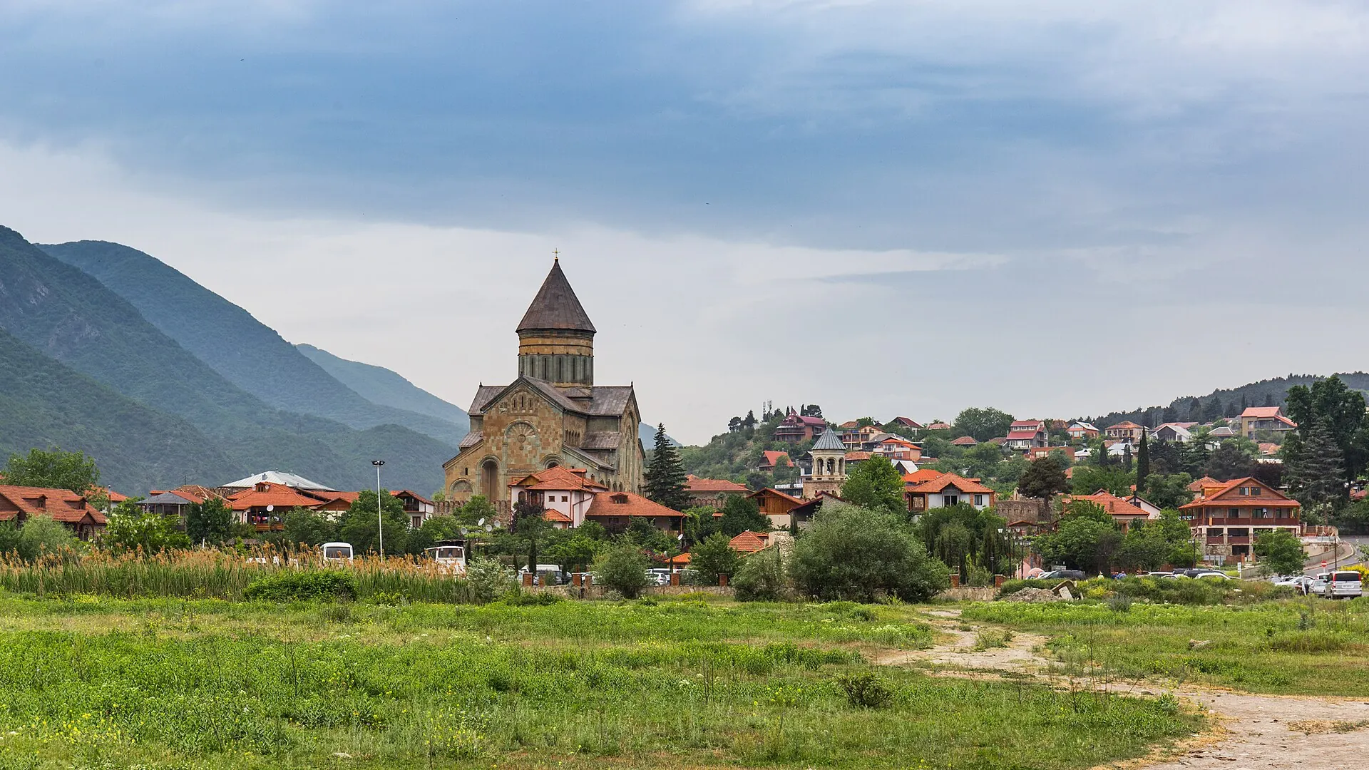 Mtskheta and Svetitskhoveli Cathedral below wooded hills