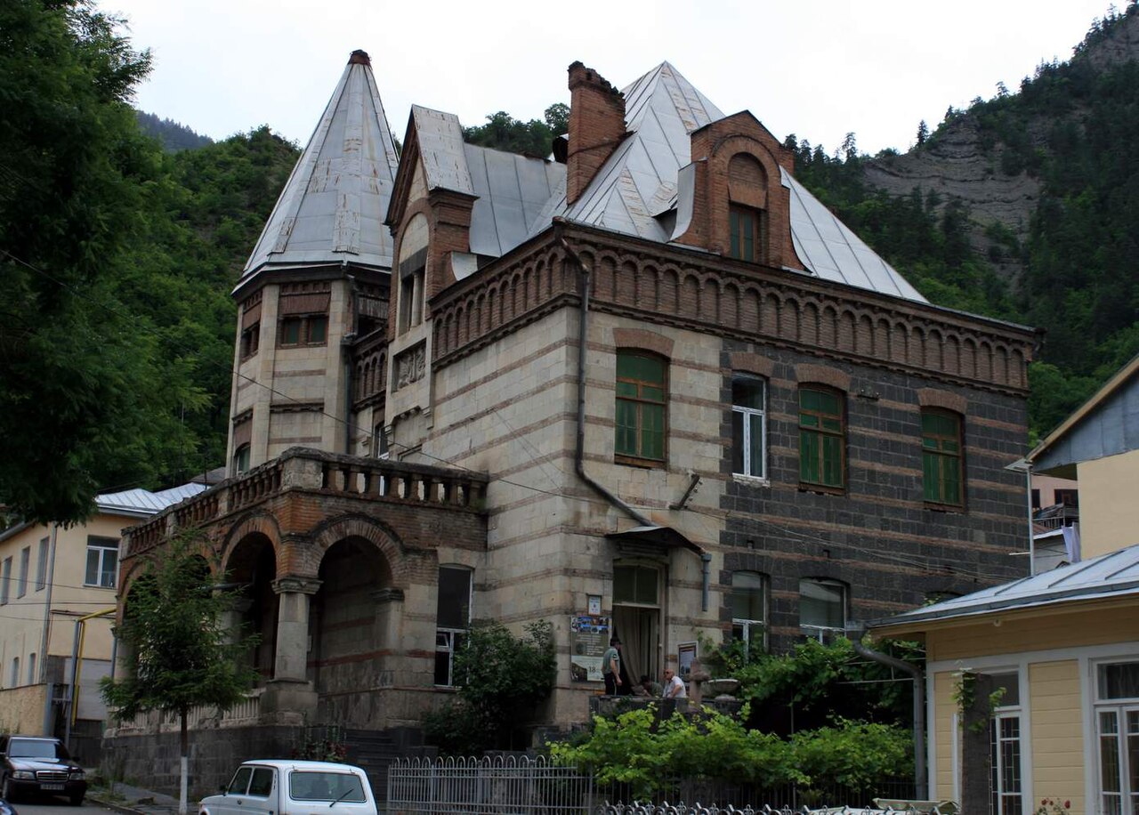 Historic stone museum building with gabled roof in Borjomi, photographed in 2011