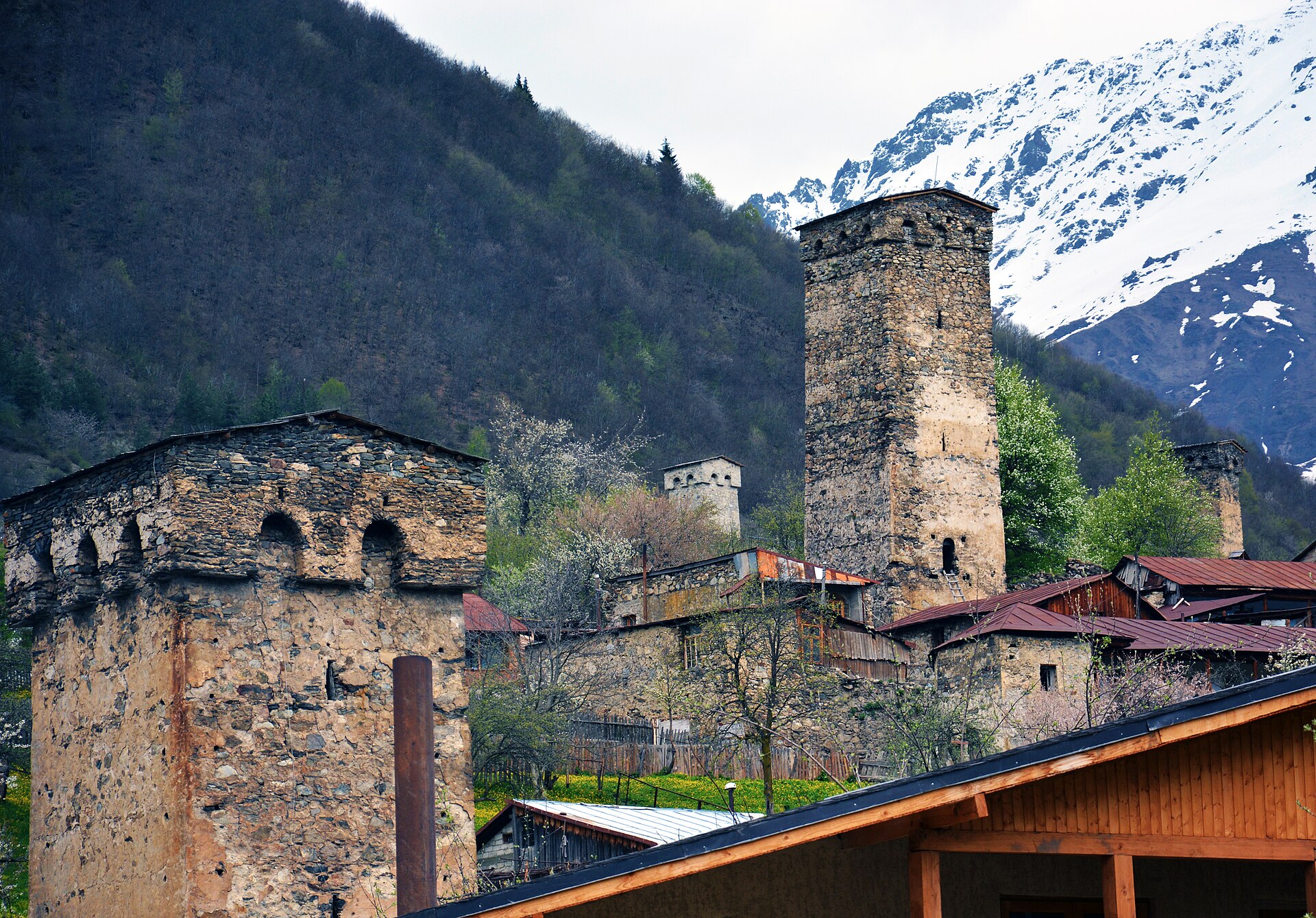 Stone Svan tower rising among houses in Mestia