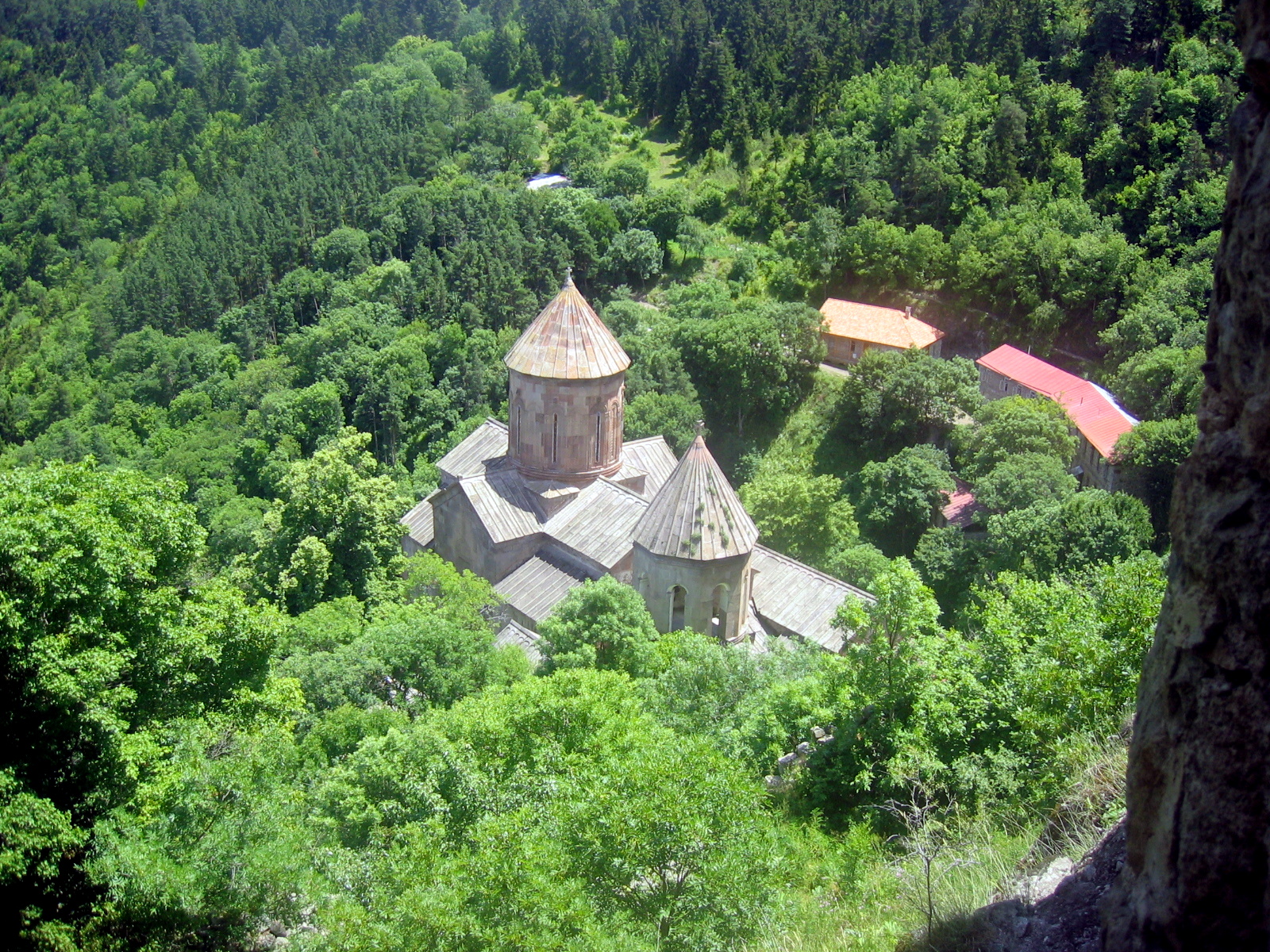 Sapara Monastery church surrounded by green forest near Akhaltsikhe